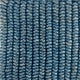 Vertically arranged blue braided abaca strands showcase fine craftsmanship and durable natural fibre in an elevated interior setting.