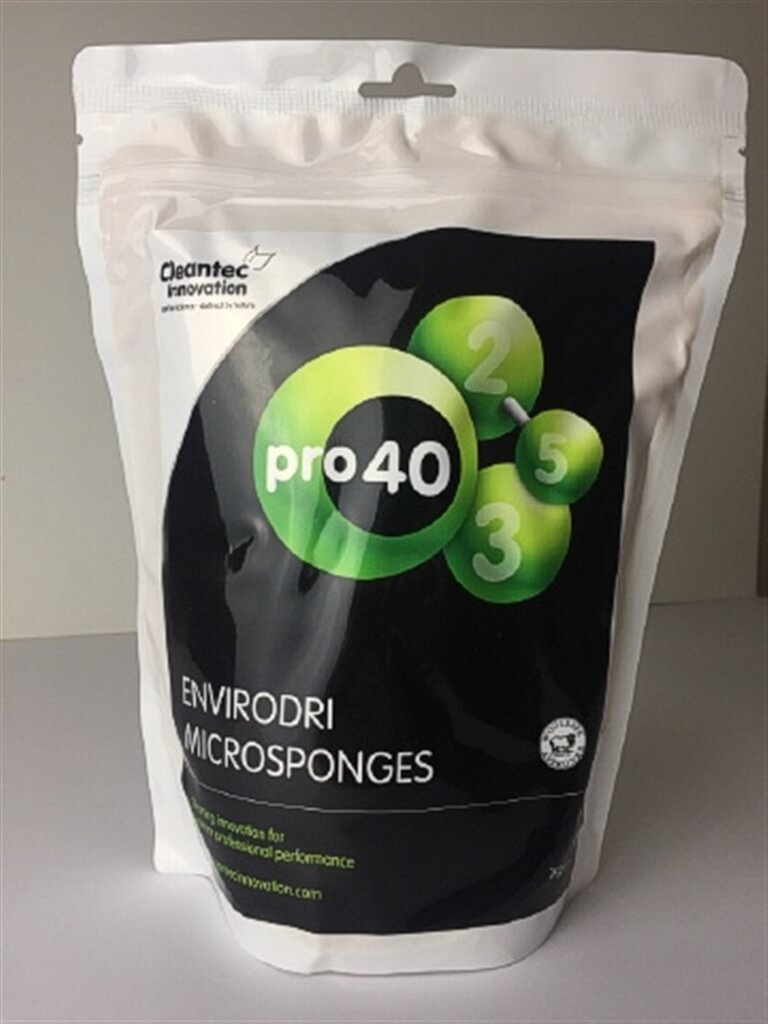 Sleek white and black pouch with green spheres on front, labeled “pro 40 Envirodri Microsponges for premium flooring.”.