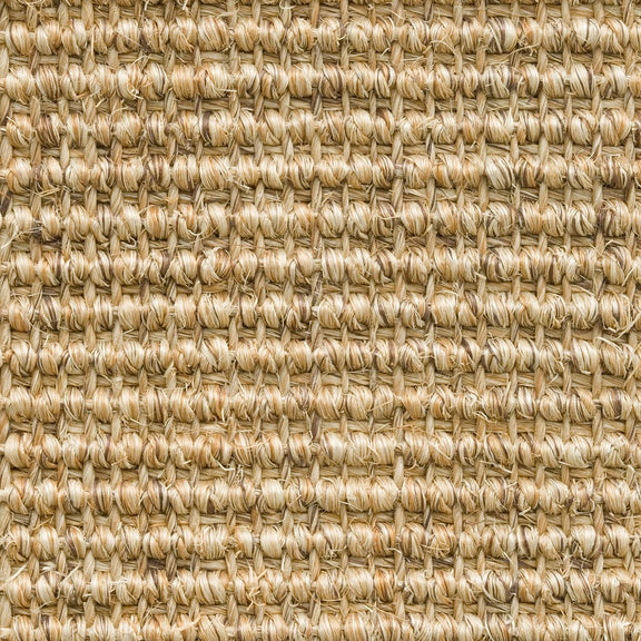 Tightly woven beige sisal flooring with fine ribbed texture, showcasing quality natural fibres and refined craftsmanship.