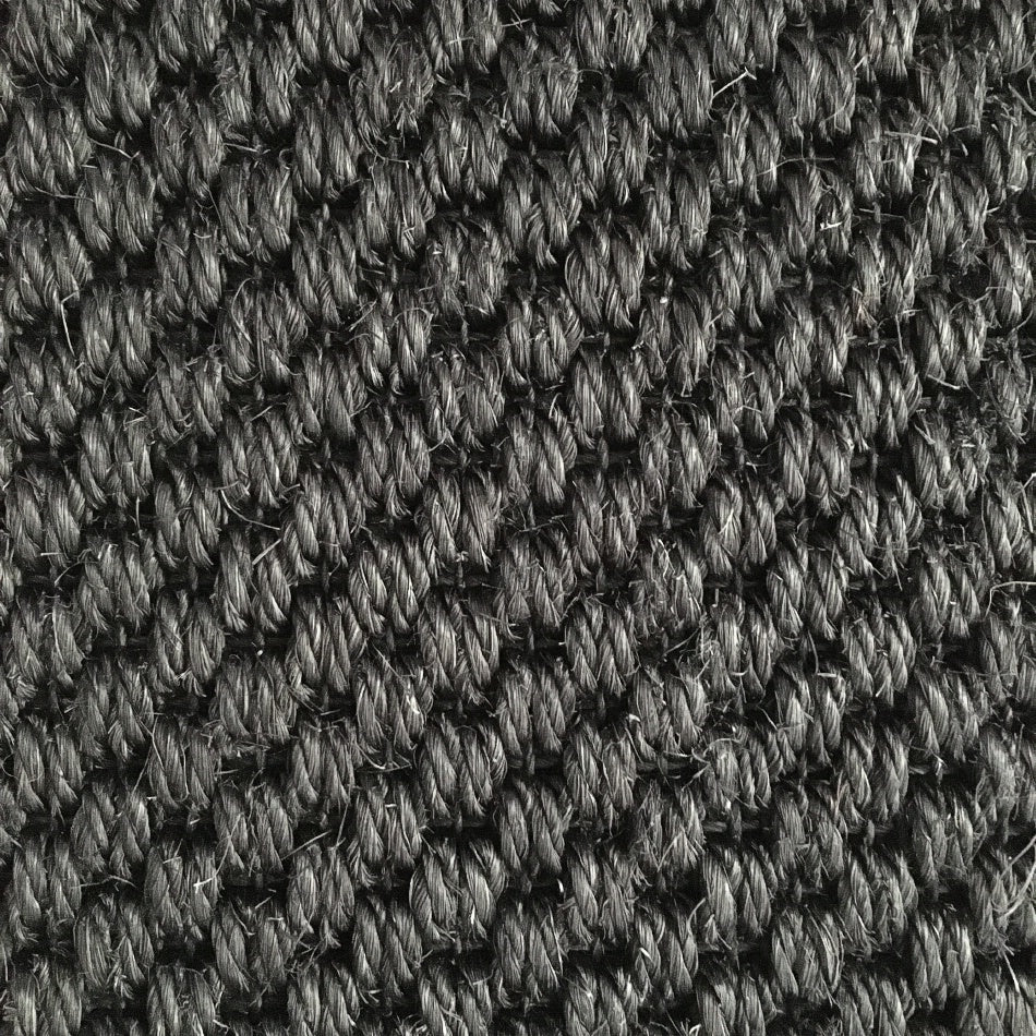 Tightly braided sisal weave with rich, natural fibers and refined texture, showcasing durability and artisanal quality.