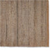 Detailed view of a jute rug in soft frost grey with textured brown and beige patterns, highlighting fine natural fibre weave.