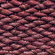 Tightly braided maroon and brown natural fibres in a refined, textured weave, showcasing rich, artisanal quality and durability.