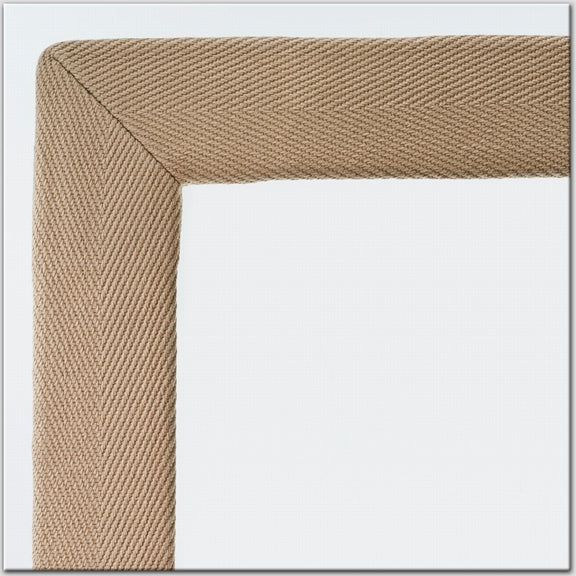 Beige cotton and linen borders in a textured weave, shown up close against a crisp white backdrop, highlighting artisanal quality.