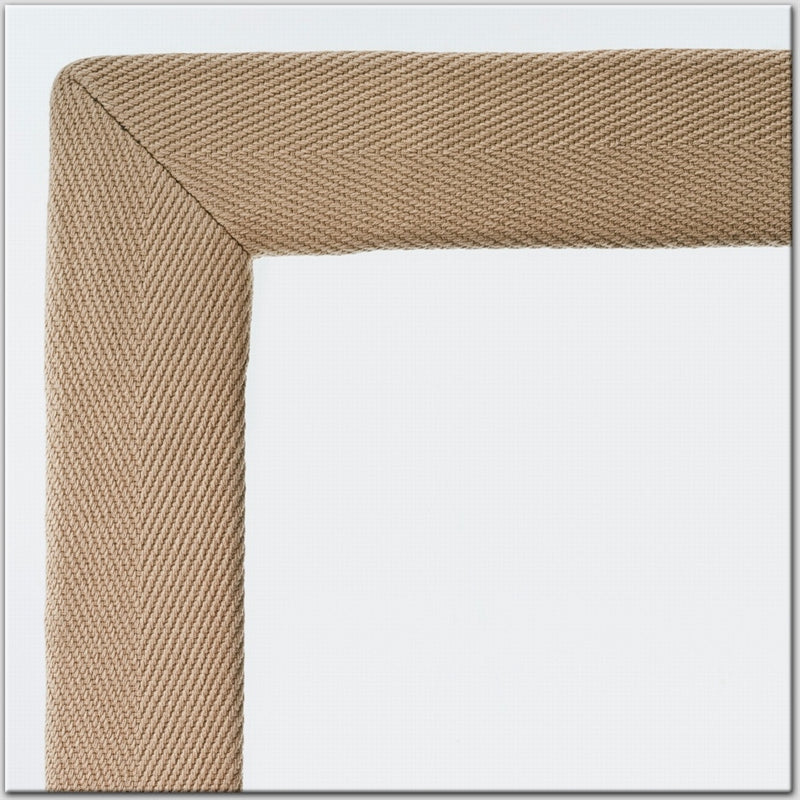 Beige cotton and linen borders in a textured weave, shown up close against a crisp white backdrop, highlighting artisanal quality.