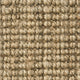 Detailed view of a finely woven, light tan jute floorcovering showcasing its natural texture and artisanal craftsmanship.