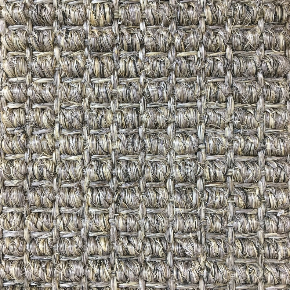 Textured beige and grey sisal rug in a refined basketweave, highlighting natural fibres and detailed craftsmanship.