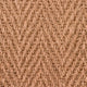 Detailed view of a herringbone coir rug, showcasing handwoven jute texture and warm natural brown fibres.