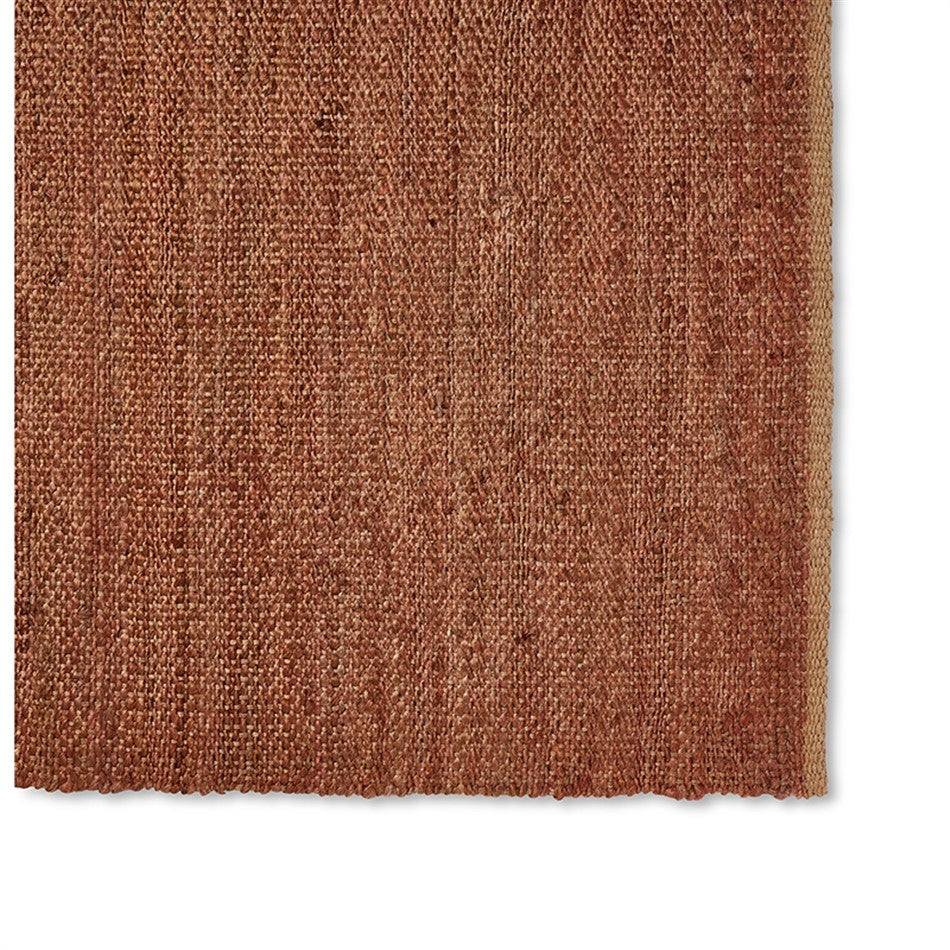 Ochre jute runner with a slightly irregular edge, showcasing natural fibre texture against a clean white background.