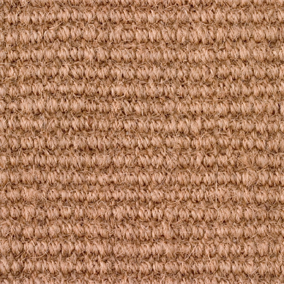 Detailed view of natural coir flooring with ribbed texture, highlighting its rich fibres and refined, sustainable craftsmanship.