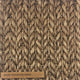 Detailed view of thick, hand-braided natural fibers in a refined herringbone weave; label reads Abaca - Rocky Mountain.
