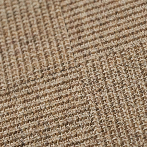 Beige and brown sisal tiles in a refined check pattern, showcasing natural fibers and artisanal quality for sophisticated interiors.