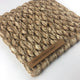 A thick, woven natural fibre mat in warm cornsilk tones, showcasing quality craftsmanship and sustainable elegance.