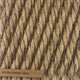 Detailed view of finely woven golden abaca fibres, highlighting natural texture and artisanal craftsmanship.