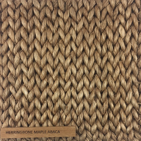 Detailed view of a finely woven herringbone maple mat, highlighting natural abaca fibers and refined craftsmanship.